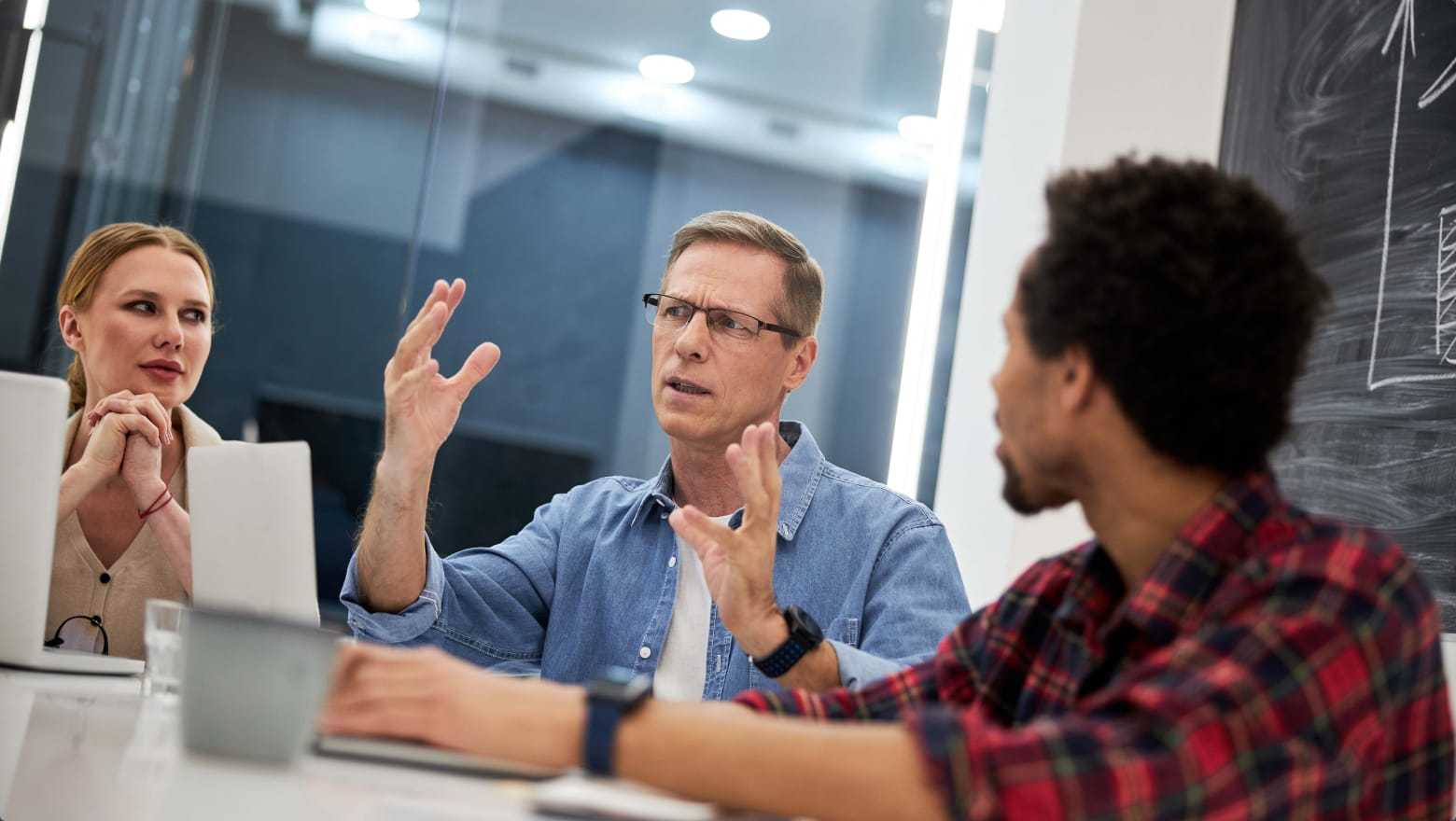 Employees in a meeting.